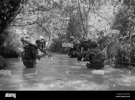 vietnam war  marines move  water  quang tri province stock