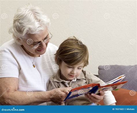 Grandmother And Grandson Reading Book Royalty Free Stock Image
