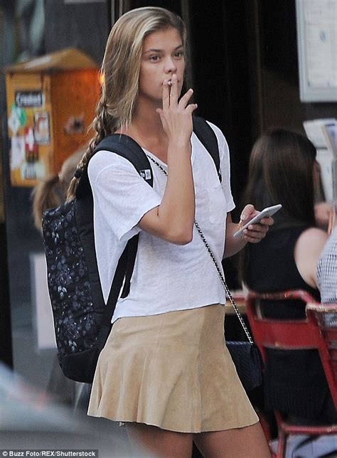 model nina agdal spotted puffing on a cigarette while headed to dinner