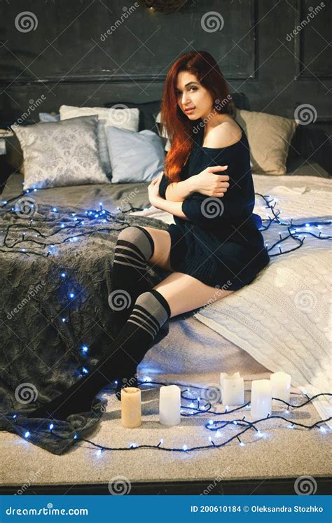 Redhead Woman Stay At Home Alone To Celebrate New Year And Sitting On A