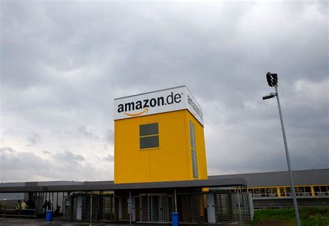 amazon considers opening stores  germany report firstpost
