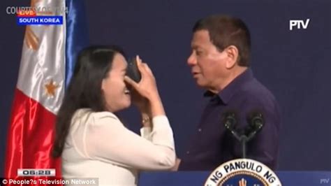 phillipine president rodrigo duterte kisses filipino