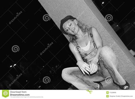 squatting woman with cap royalty free stock image image 11228666