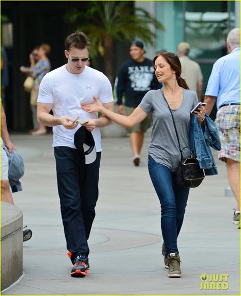 minka kelly grabs chris evans chest at the movies