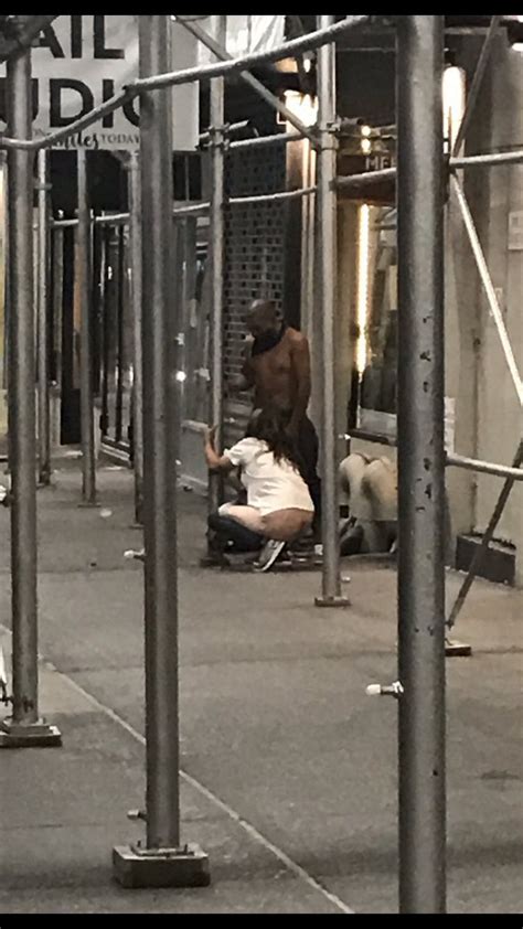 Urinating Woman Caught Giving Oral Sex To Shirtless Man In