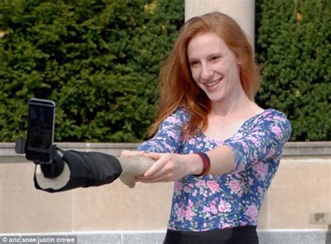 selfie arm make it look as if you re holding hands in pictures daily mail online