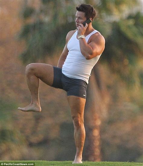 mark wahlberg shows off his impressive physique in a tight