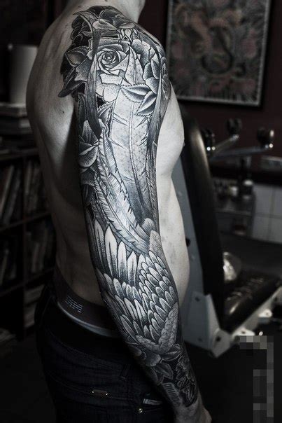 feather wings and roses graphic tattoo sleeve best