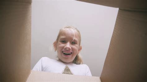 surprised girl unpacking opening carton box stock footage sbv 337763340