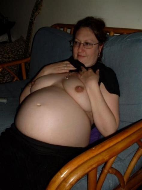 pregnant wife shows off her belly