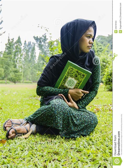 Indonesian Moslim Girl With A Quran Stock Images Image