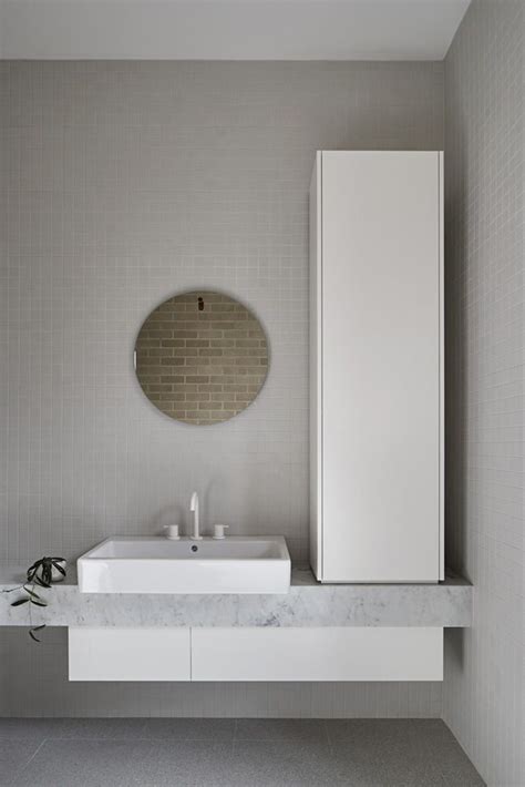 sink  mirror   bathroom  white tile   wall