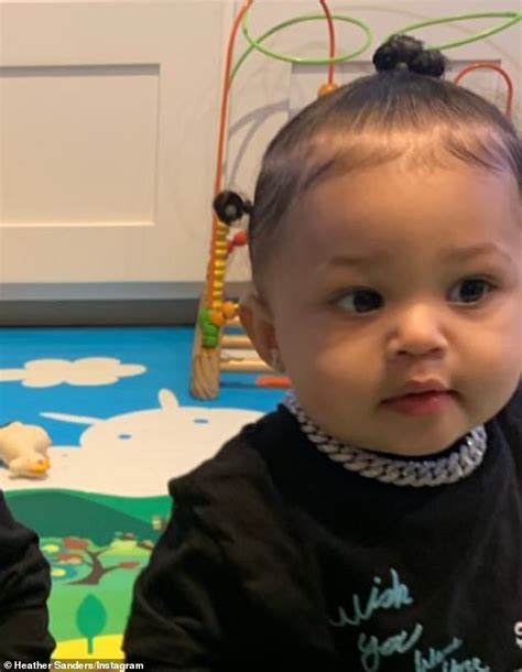 travis scott buys one year old daughter stormi a diamond chain necklace featuring lightning bolt