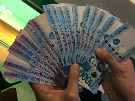 philippine peso slumps  weakest dollar exchange rate