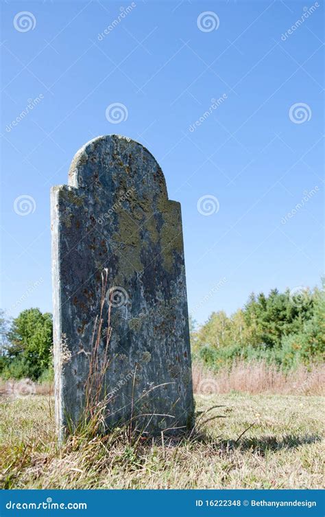 gravestone   clear blue sky stock photo image  cemetery