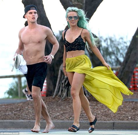 shirtless gary beadle frolics on the beach with dj tigerlily after