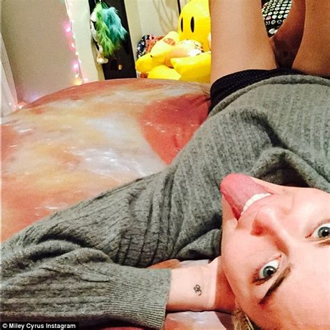 Miley Cyrus Shows Off New Cheesy Bedspread After Declaring
