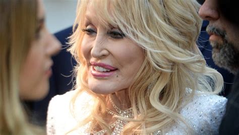 dolly parton explains why she sleeps with her makeup on
