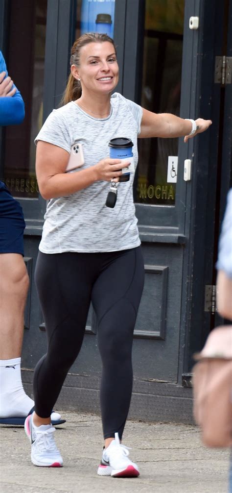 coleen rooney pictured chatting outside cafe nero in