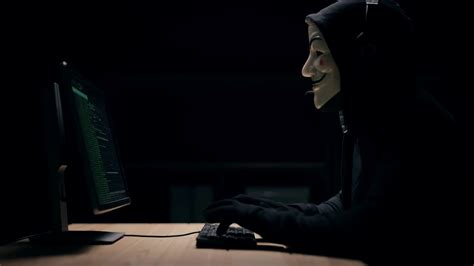 masked hacker typing stock footage sbv  storyblocks