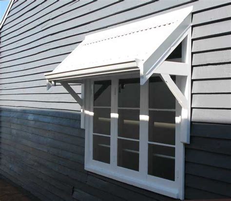 pin  amber webster  white street house awnings outdoor window awnings house interior