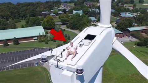 crazy sunbather drone spots guy tanning  windmill