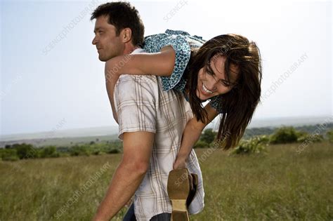 man carrying woman stock image  science photo library