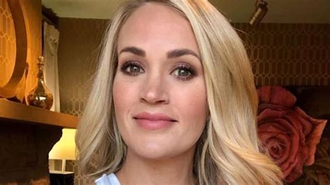 carrie underwood flaunts legs in daisy dukes and thigh highs