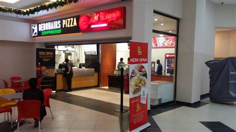 biggs  debonairs outlet contemporary architecture limited