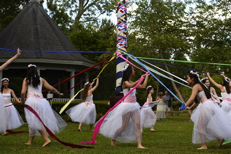 dancers wrap maypole  festival beaumont enterprise