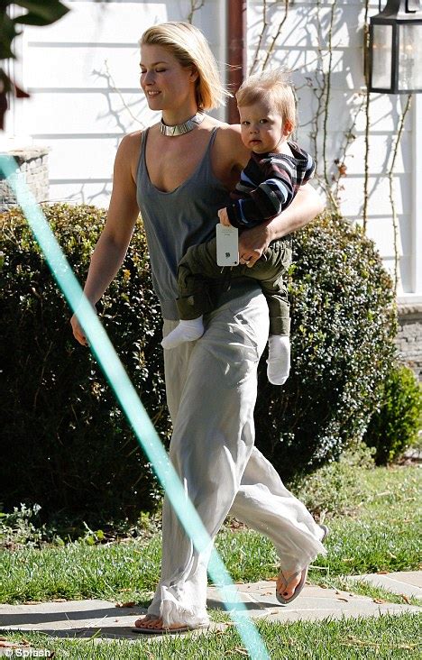 ali larter builds muscles lifting theodore who is a dutiful pa clutching her phone daily mail