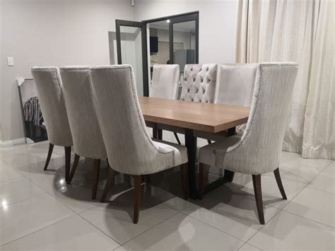 elelwani  seater dining table chivalry designs