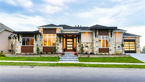 huge bow windows topped  transoms   rear   gorgeous contemporary craftsman house