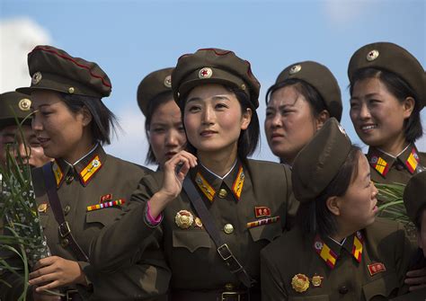 Smiling North Korean Female Soldiers In Tower Of The Juche