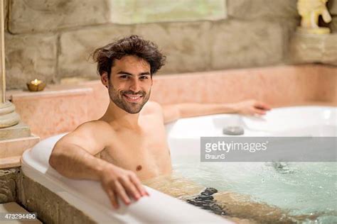man in hot tub photos and premium high res pictures getty images