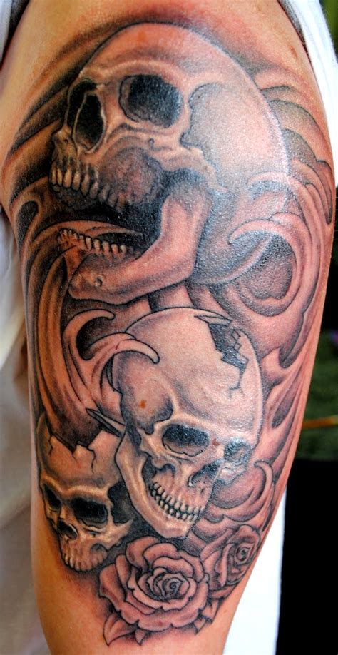atomik skulls tattoo