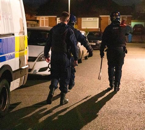police storm 8 homes in greater manchester in major county