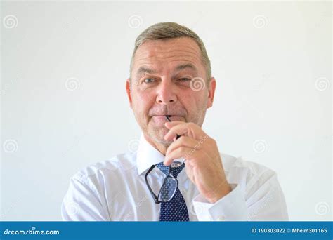 businessman raising  eyebrows   smile stock photo image