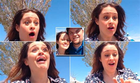 man proposes to his girlfriend while pretending to take a selfie in