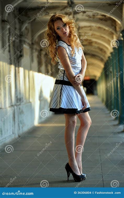beautiful woman posing  nyc subway station stock photo image
