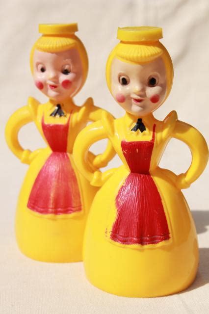 merry maid vintage plastic laundry sprinkler yellow and red girls pair