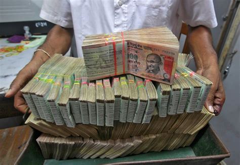 indian rupee recovers marginally  falling  week   rate cut