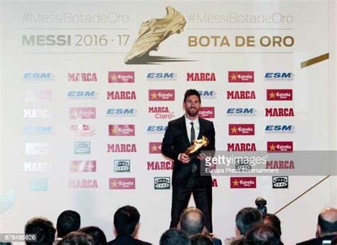 lionel messi receives bota de oro award in barcelona photos and premium