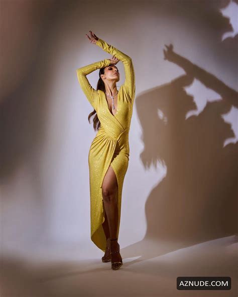 Malaika Arora Yellow High Slit Dress With Sexy Plunging Neckline At