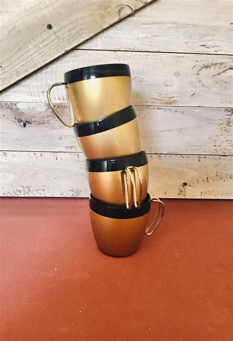 mid century   usa thermal gold  black cups  metal etsy metal vintage items gold
