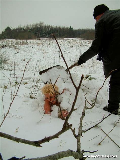 blonde slave girl is gagged and buried naked in the cold snow pichunter