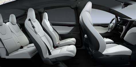 tesla updates model    front seats   space  seat pockets electrek