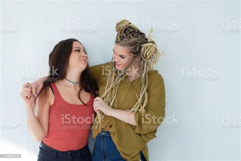 Portrait Of Two Girls Hugging Friendship Concept Smiling Teenagers