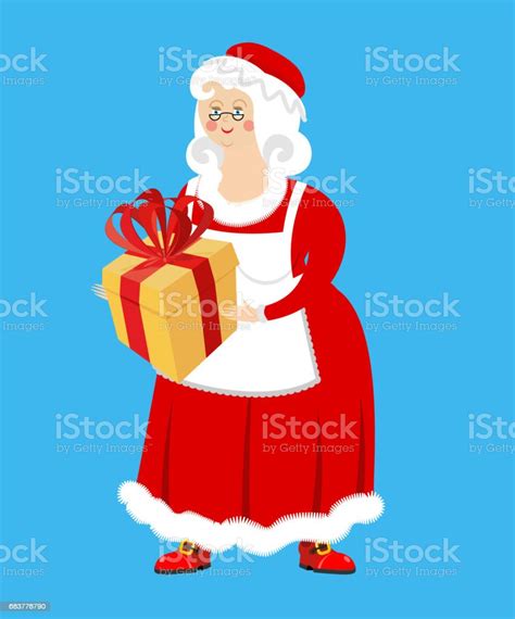 mrs claus and t wife of santa claus and box christmas woman in red