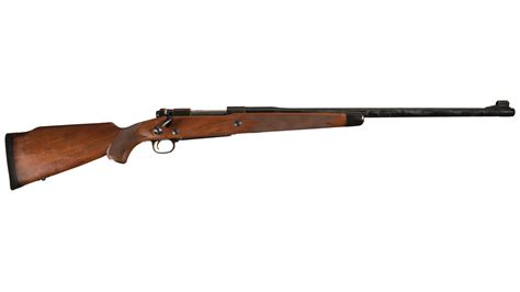 winchester model  bolt action  winchester magnum rifle rock